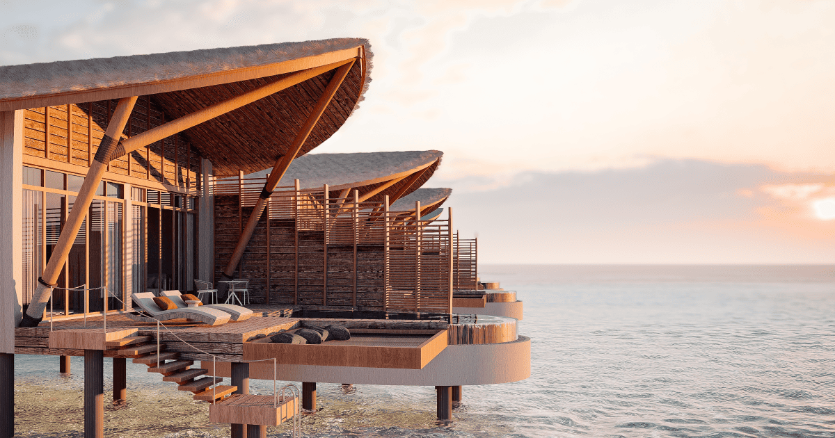 Aura Maldives – offizielle Visualisierung einer Overwater-Villa bei Sonnenuntergang