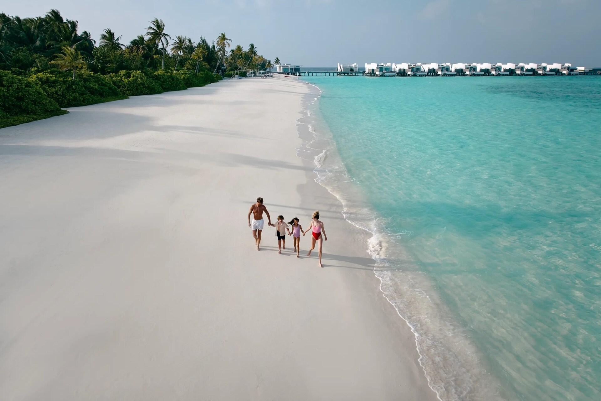Strandspaziergang mit Blick auf die Villen