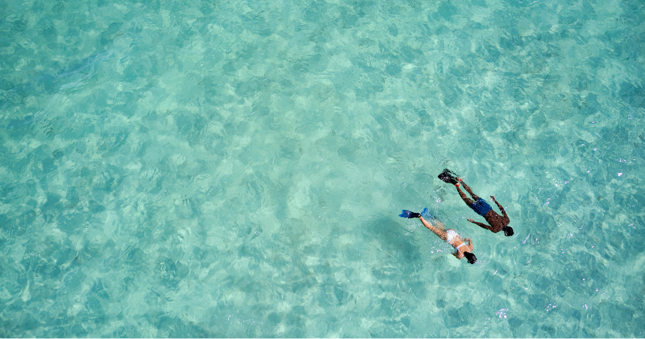 COMO Cocoa Island – Schwimmen in der Lagune