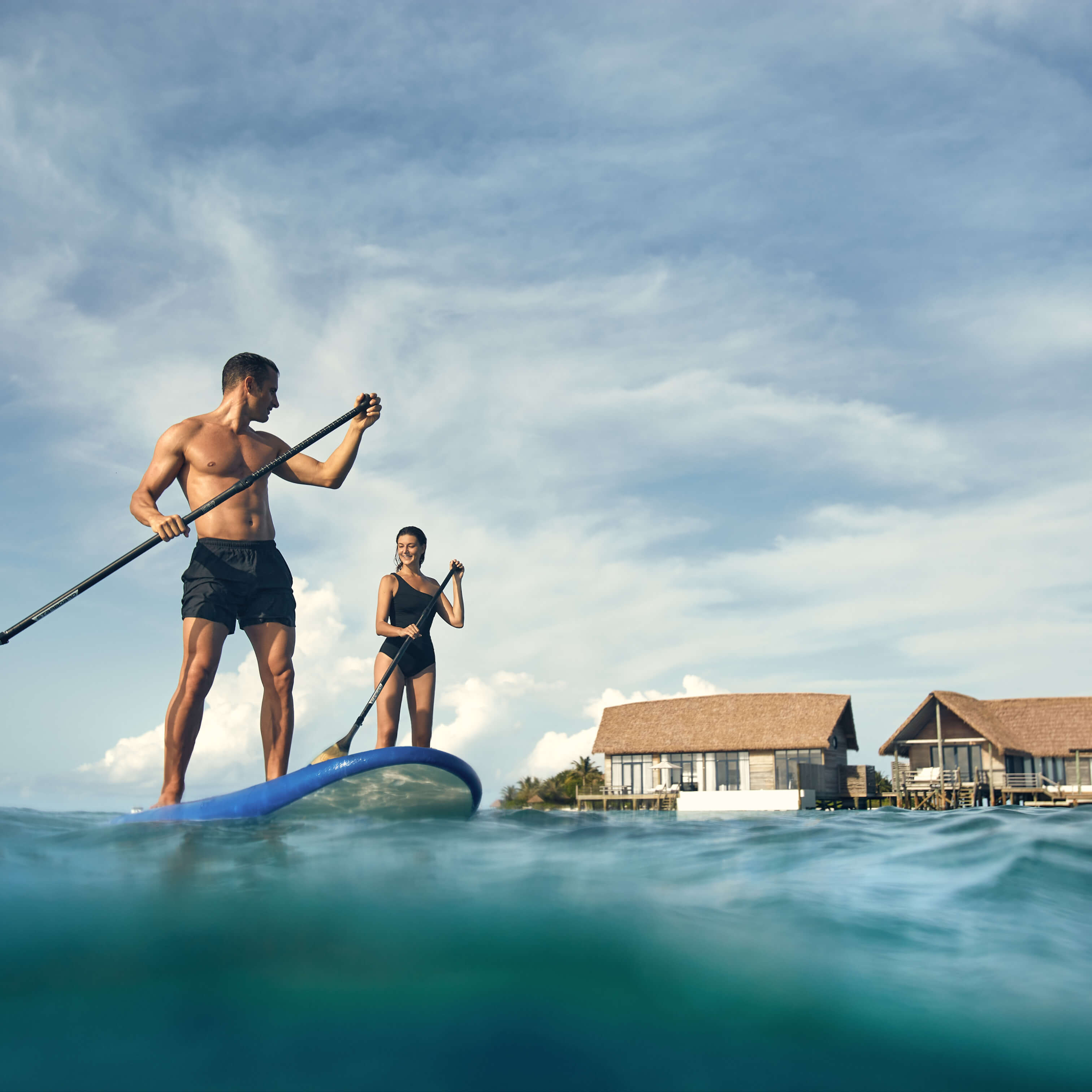 COMO Cocoa Island – Stand-up-Paddleboard in der Lagune