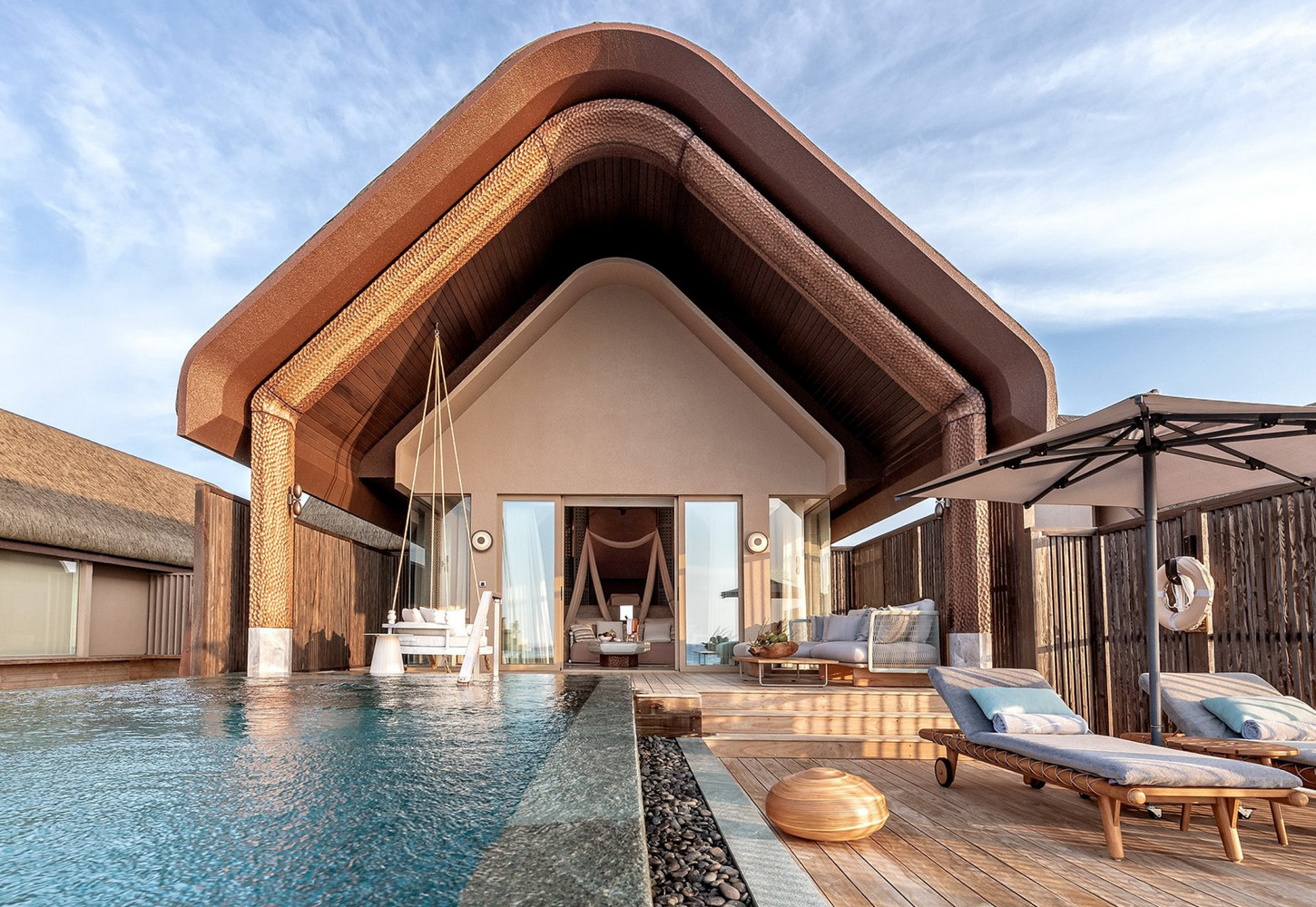 Ozean-Poolvilla in Sonnenuntergangslage - Bild 1